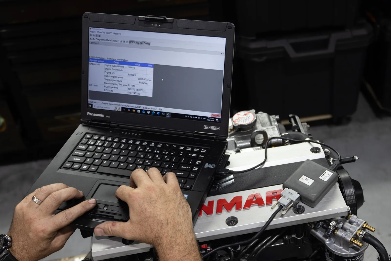 Yanmar SmartAssist dealer diagnostic software running on a laptop at Sydney Diesel Marine
